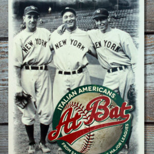 The exhibition catalogue Italian Americans at Bat, the cover featuring three baseball players in black and white, while the title is displayed in a sticker-like design at the lower right corner, with a baseball in the background.