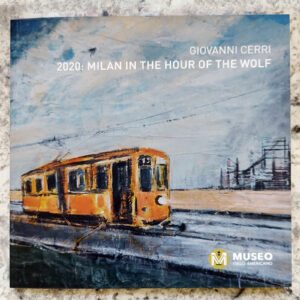 The exhibition catalogue Giovanni Cerri 2020: Milan in the Hour of the Wolf, the cover featuring a typical orange Milan tram running on tram rails at an angle from left to right, with the sky a classic industrial city color with light poles on the right.