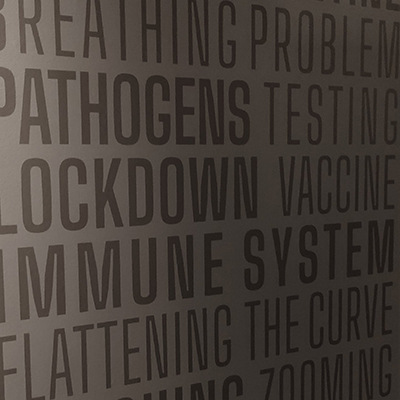 A detail of one of the walls shows text composed of words connected to the pandemic, such as "pathogens," "lockdown," and "immune system."