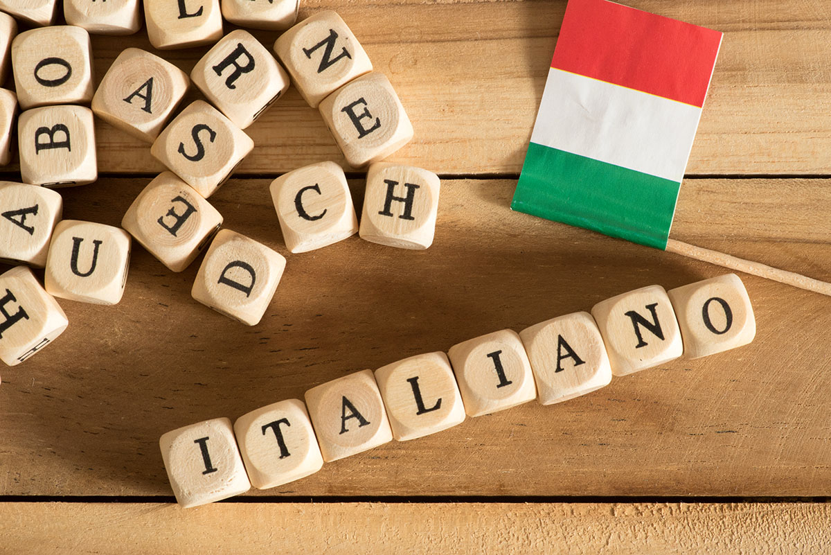 Wooden Letters with Italian flag and the italian word Italiano