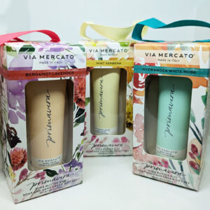 The three Primavera Shea Butter Duos pictured together, each in their boxes with their own floral design and a hanging ribbon.