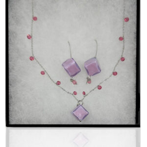 An earring and necklace set featuring pale purple cube-shaped glass beads on a silver chain and earring hooks, with pink dangling accent beads.