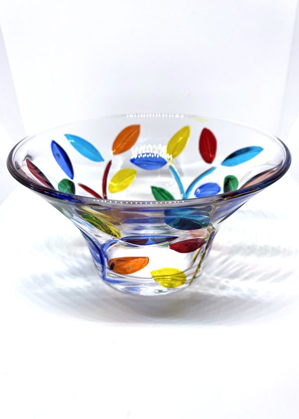 Small pieces were made in Murano glass with a flower vine design repeated in a pattern. The stems are in blue, while the leaves are in green, yellow, orange, red, and blue tones.